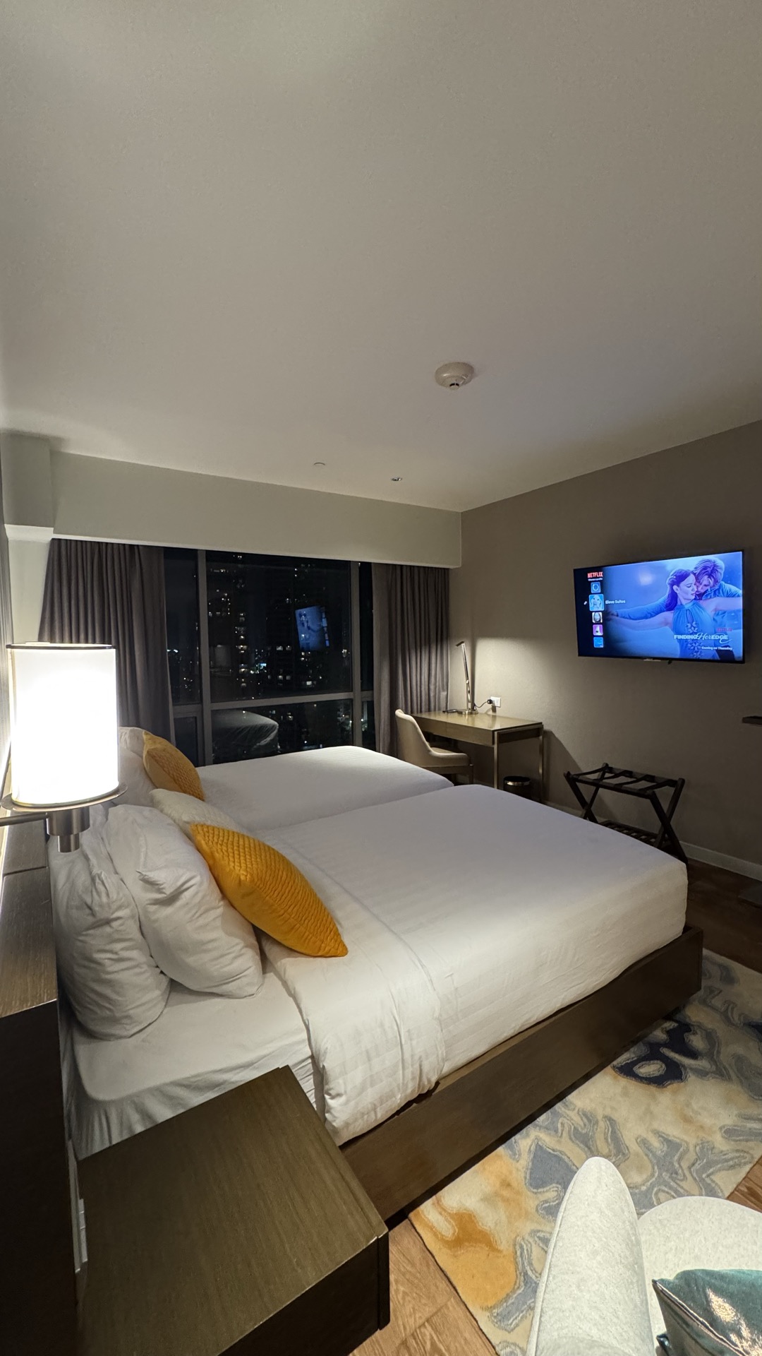 Living area at Eleve Suites with soft morning light.